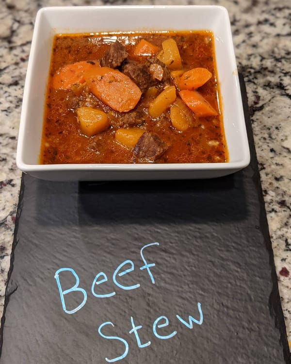 Instant pot beef stew with sweet potato butternut squash and carrots and a nice glass of Rumpus 2019 Cabernet Sauvignon.  after having no power for so many days it's nice to actually have a good home cooked meal.